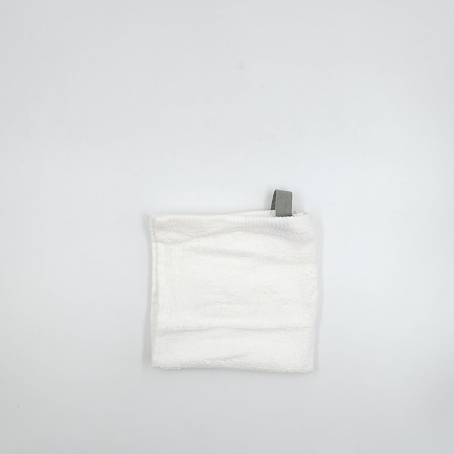 A white towel with a personalized Arabic name written on it. Customized gifts for all occasions Amman Jordan