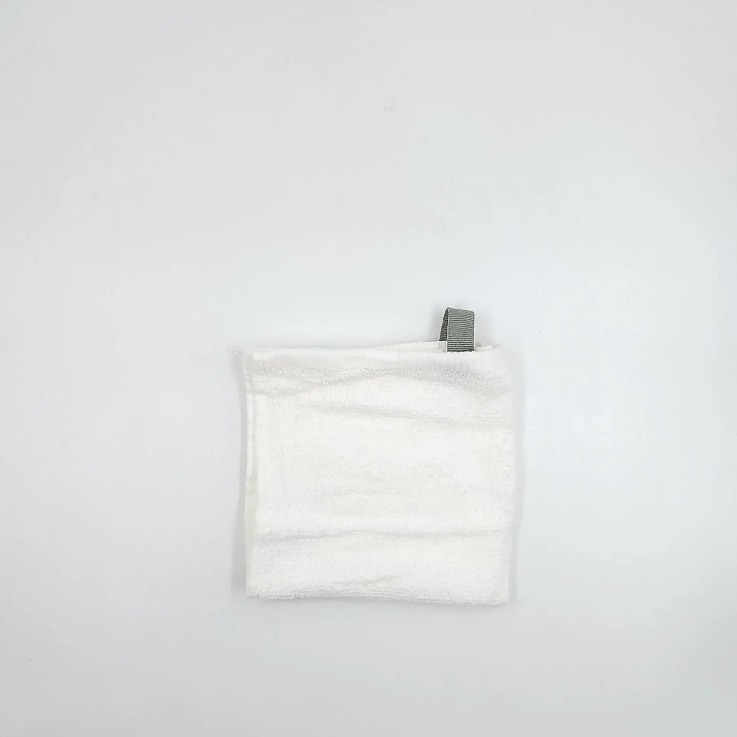 A white towel with a personalized Arabic name written on it. Customized gifts for all occasions Amman Jordan