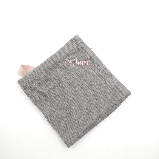 Gray towel with pink text Customized gifts for all occasions Amman Jordan