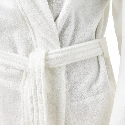 Close-up of a white robe with a belt on a white background