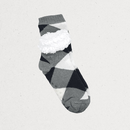 Winter cozy slipper socks with a grey knitted pattern, fluffy white cuff, and non-slip grip dots on the sole.