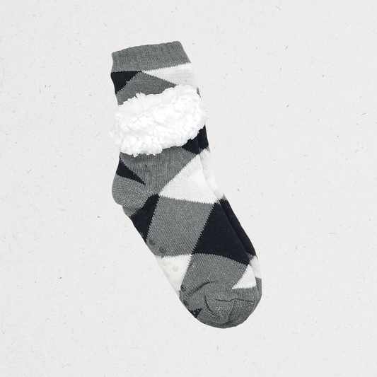 Winter cozy slipper socks with a grey knitted pattern, fluffy white cuff, and non-slip grip dots on the sole.